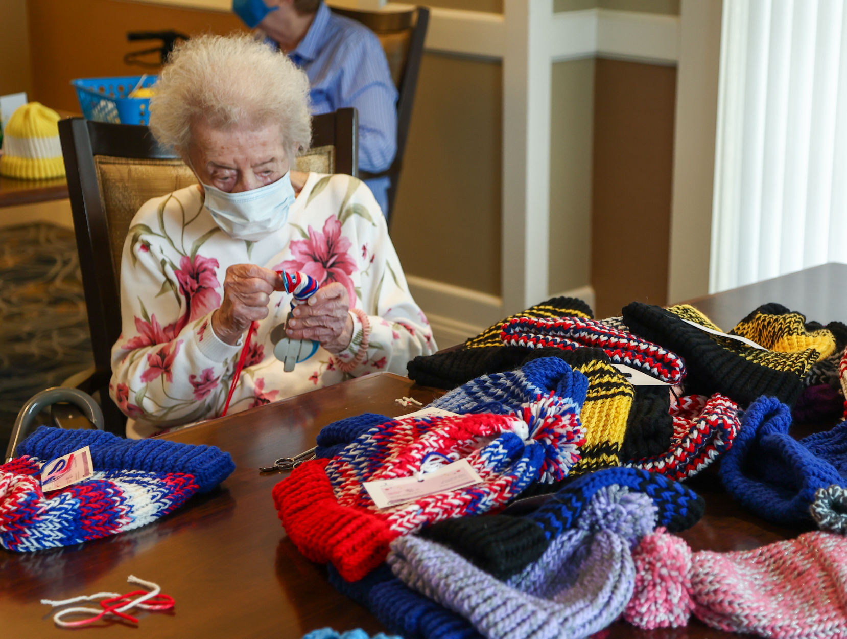Seniors use looms to create items for charities